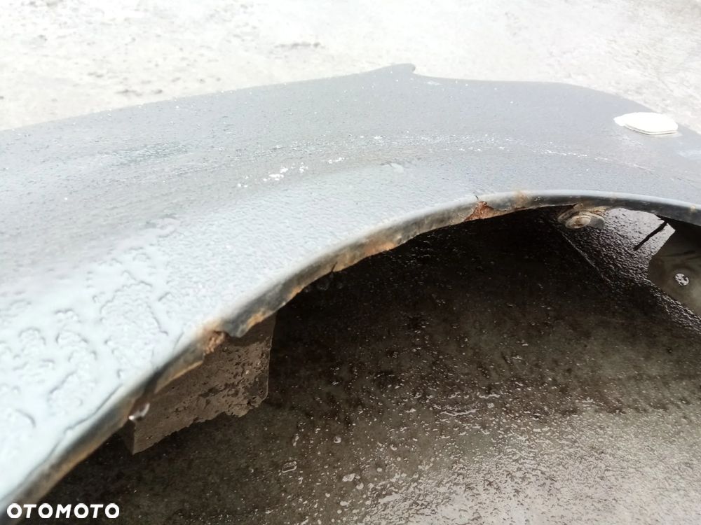 VOLKSWAGEN CADDY 03 - 10 - BLOTNIK PRZÓD LEWY - 2