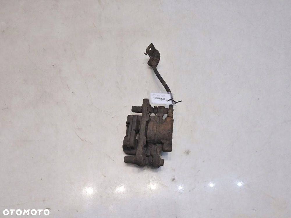 ZACISK HAMULCOWY PRAWY TYŁ MITSUBISHI LANCER VIII 1.8 - 5