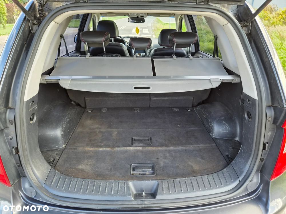 Kia Carens - 33