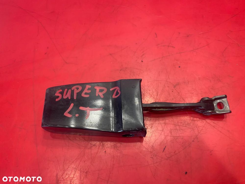 OGRANICZNIK LEWY TYŁ SKODA  SUPERB 2 - 1