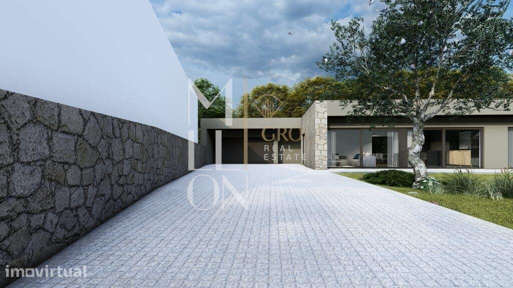 Moradia Moderna com Piscina em Zona Residencial Tranquila – Vila Praia - Grande imagem: 3/27