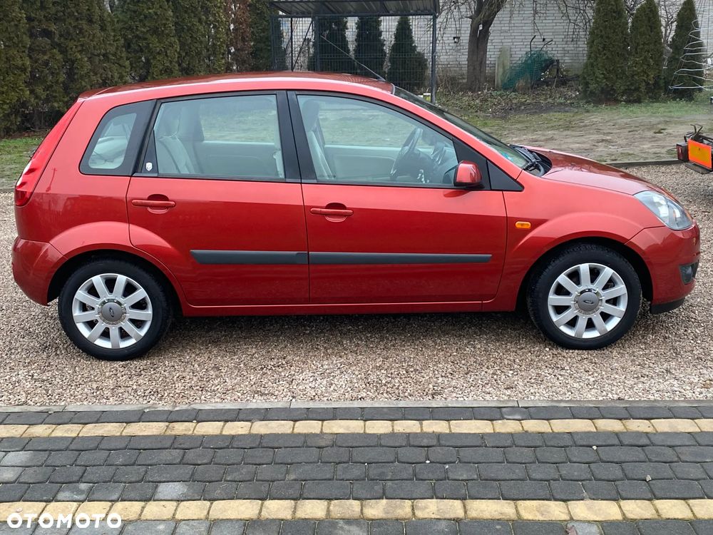 Ford Fiesta 1.4 Ghia - 12