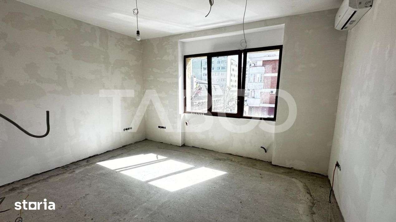 De vanzare apartament 3 camere nemobilate 56 mp cu balcon Central — fotografia 1