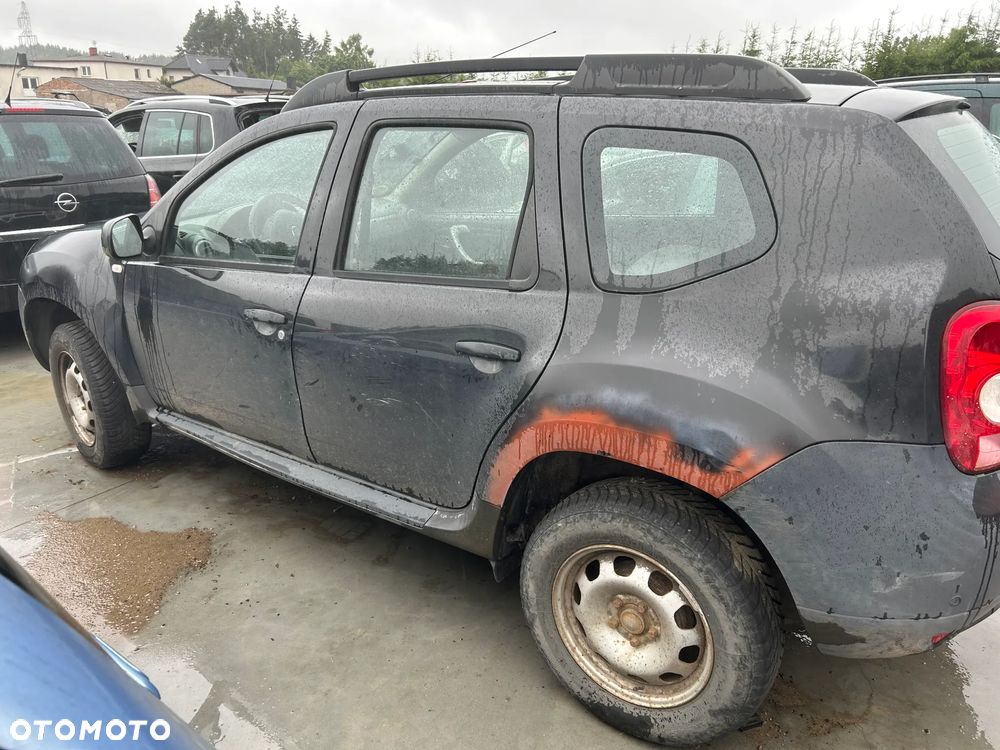 DACIA DUSTER 1 ĆWIARTKA BŁOTNIK TYŁ - 1
