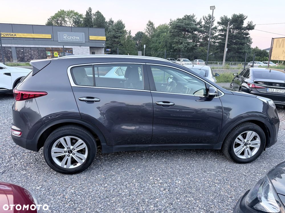 Kia Sportage - 4