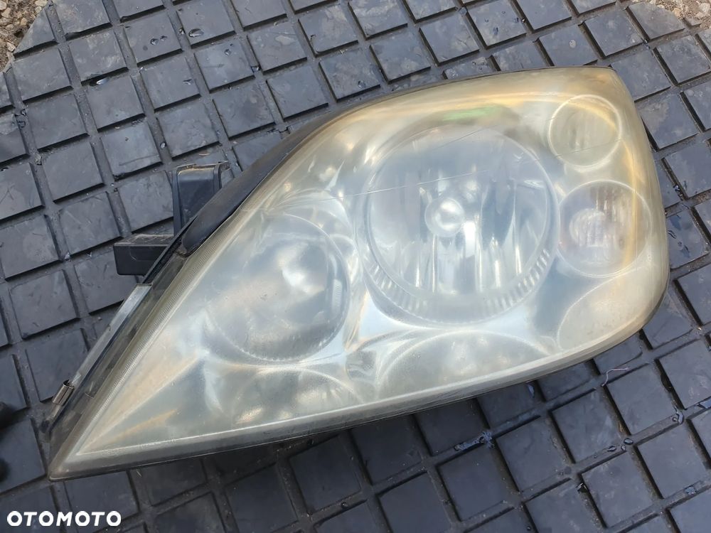 LAMPA PRZEDNIA LEWA  NISSAN PRIMERA P12 26060AU800EUROPA - 2