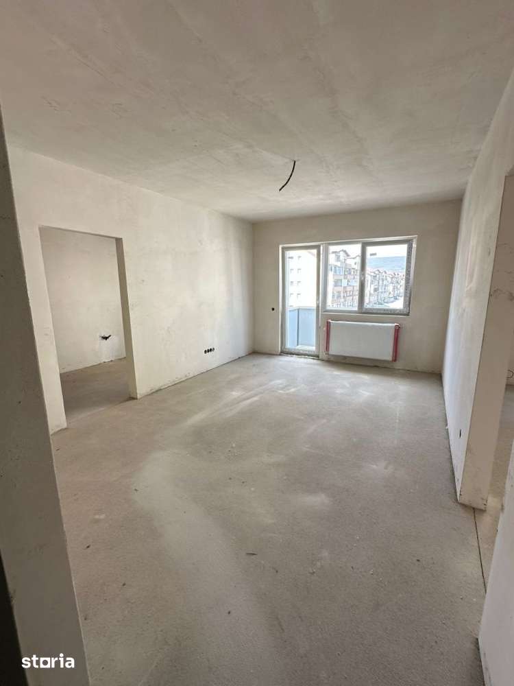 Apartament de 55 mp utili,etaj intermediar,bloc nou,zona Terra — fotografia 1