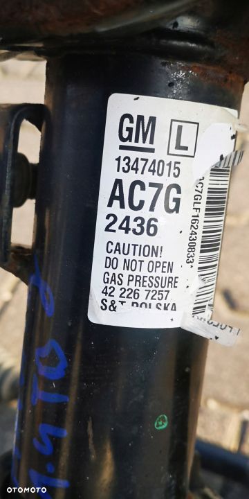 ZACISK WAHACZ LEWY PRZÓD OPEL ASTRA IV J 1.4i TB - 13