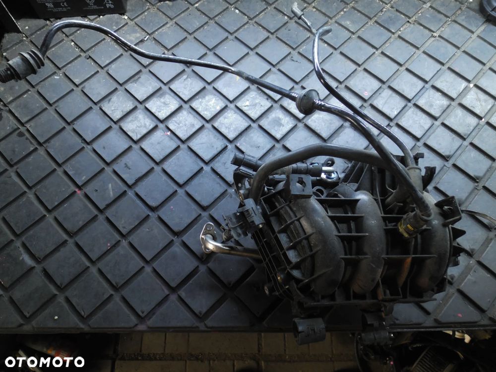KOLEKTOR SSĄCY 0280600039 OPEL CORSA C 1.0 - 1