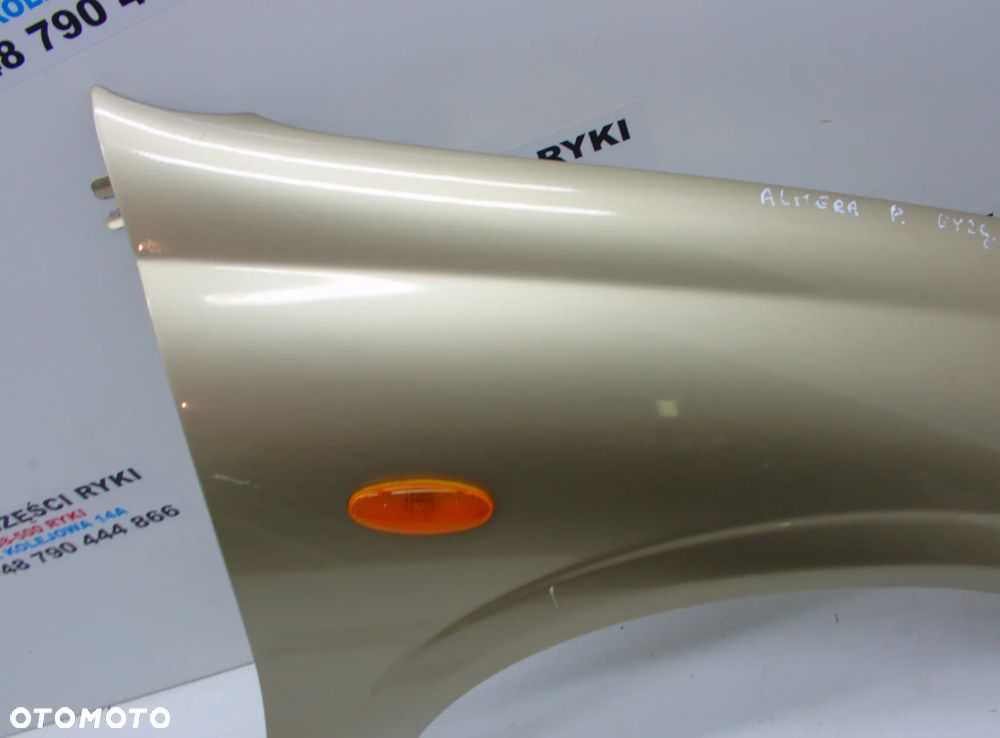 Nissan Almera  N16 Błotnik Prawy przód - 3