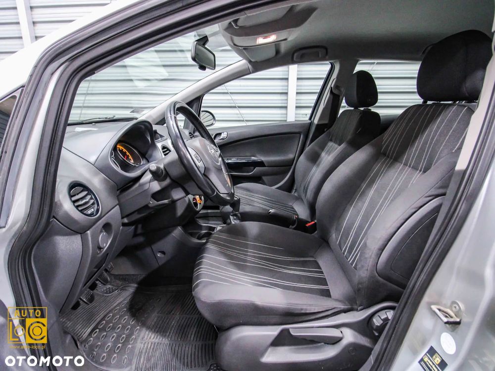 Opel Corsa 1.2 16V Enjoy - 11