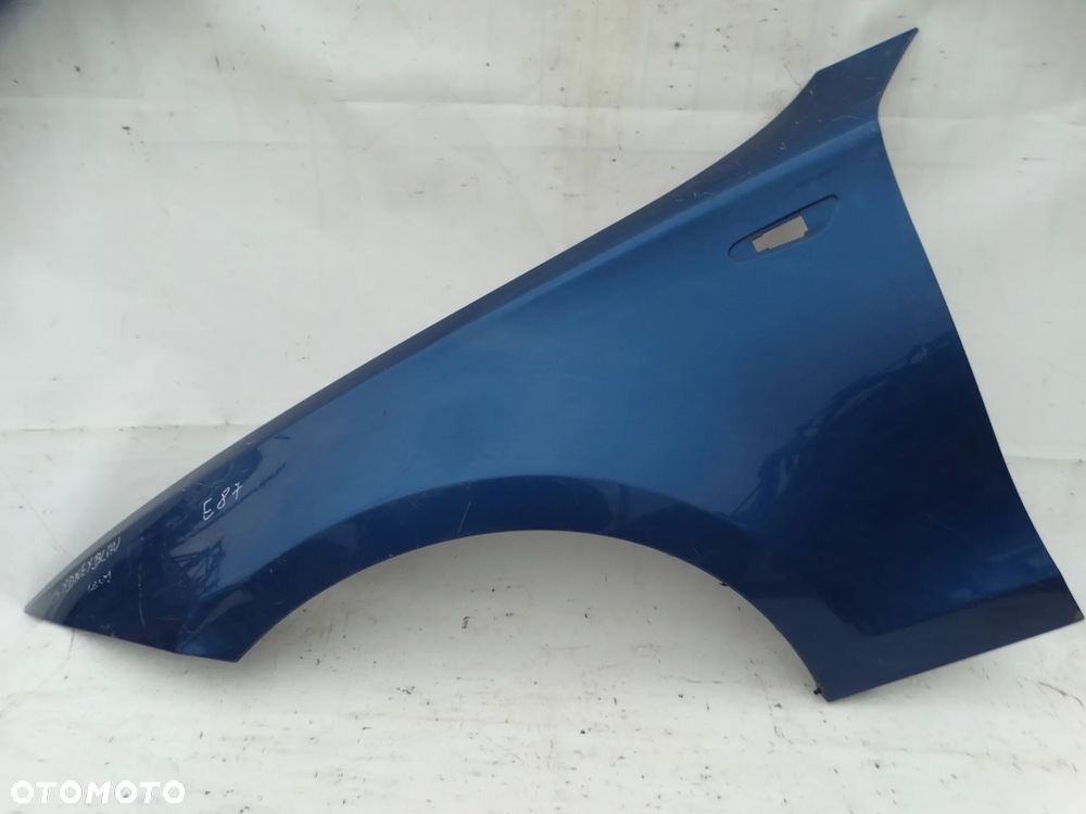 BŁOTNIK LEWY PRZÓD PRZEDNI BMW E81 E82 E87 E88 SYDNEYBLAU F-VAT - 1