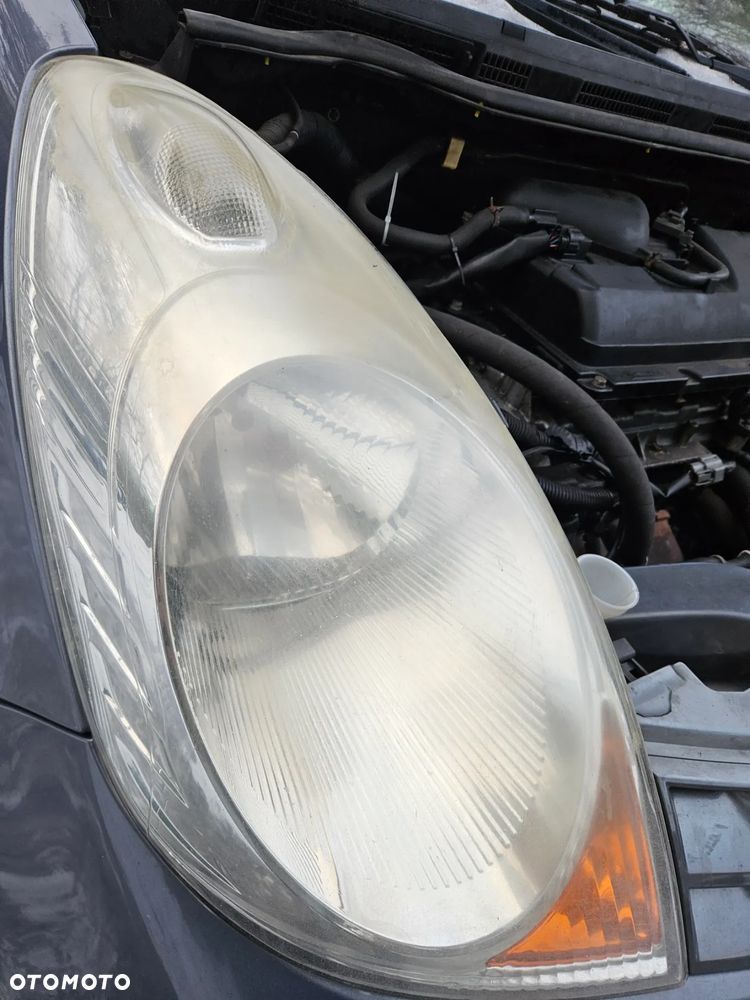 Nissan Note E11 07 lampa przód przednia  lewa - 8