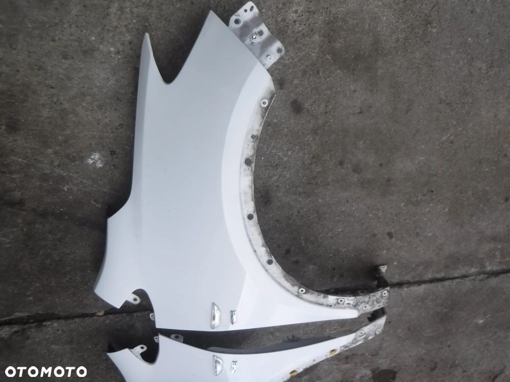 Opel  Mokka 12-16 blotnik przod lewy prawy GAZ bialy - 9