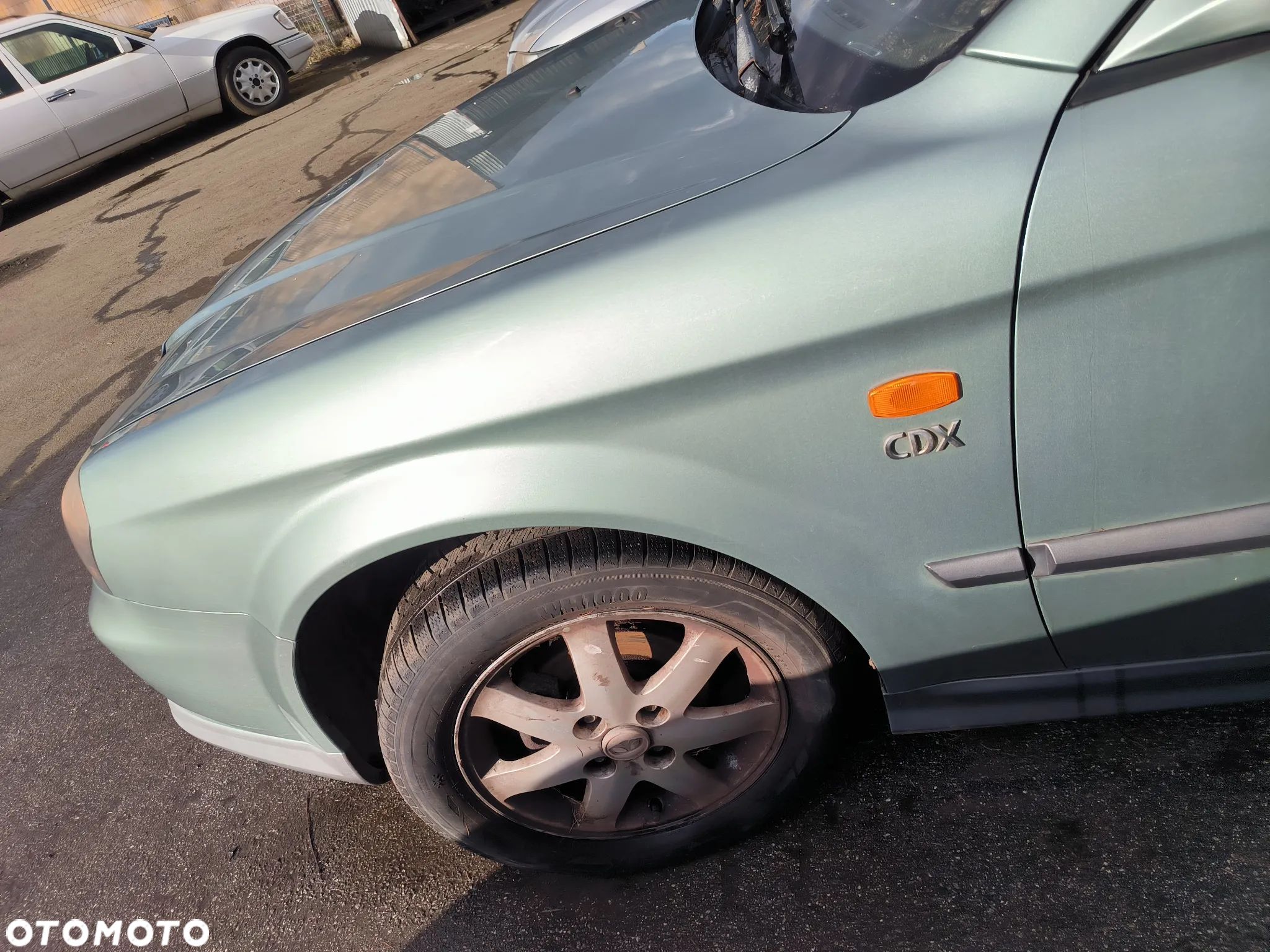 Błotnik lewy przedni Daewoo Evanda - 1