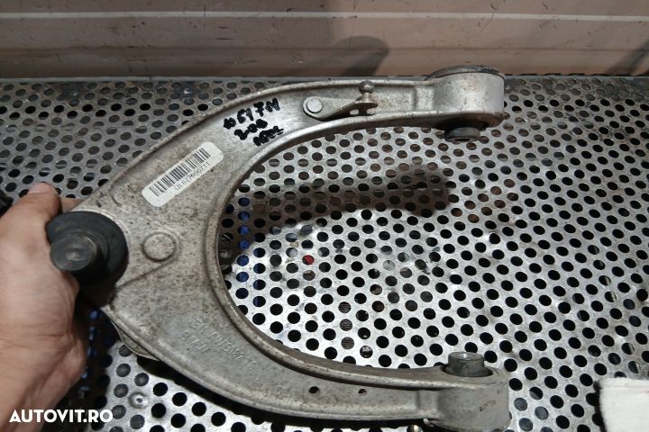 Brat superior fata stanga spre fata QL677596711 QL677596711 BMW Seria - 1
