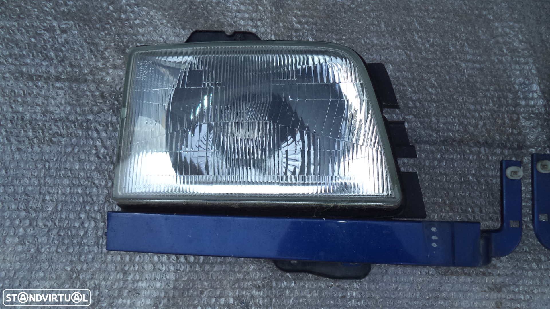 Farol (Optica) Opel Monterey ano 1999 (original , ver descriçao) - 2