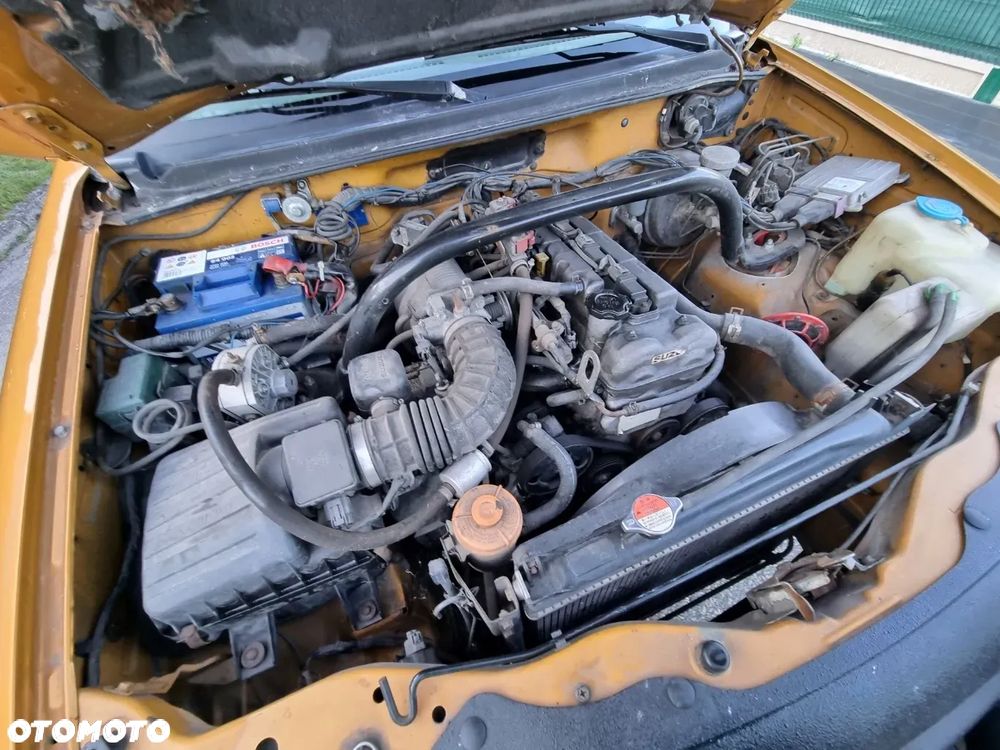 Suzuki Grand Vitara 2.0 - 12