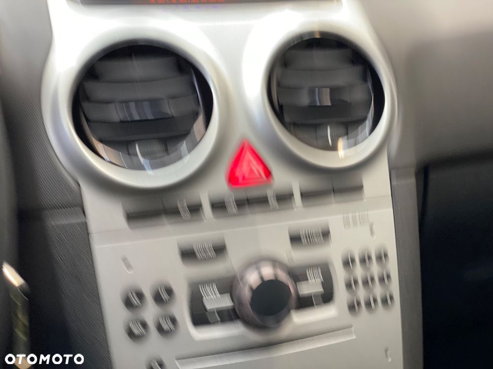 Opel Corsa 1.2 16V Enjoy - 23