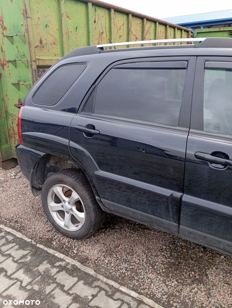 KIA SPORTAGE II LIFT DRZWI PRAWE TYŁ TYLNE GOŁE 1K - 1