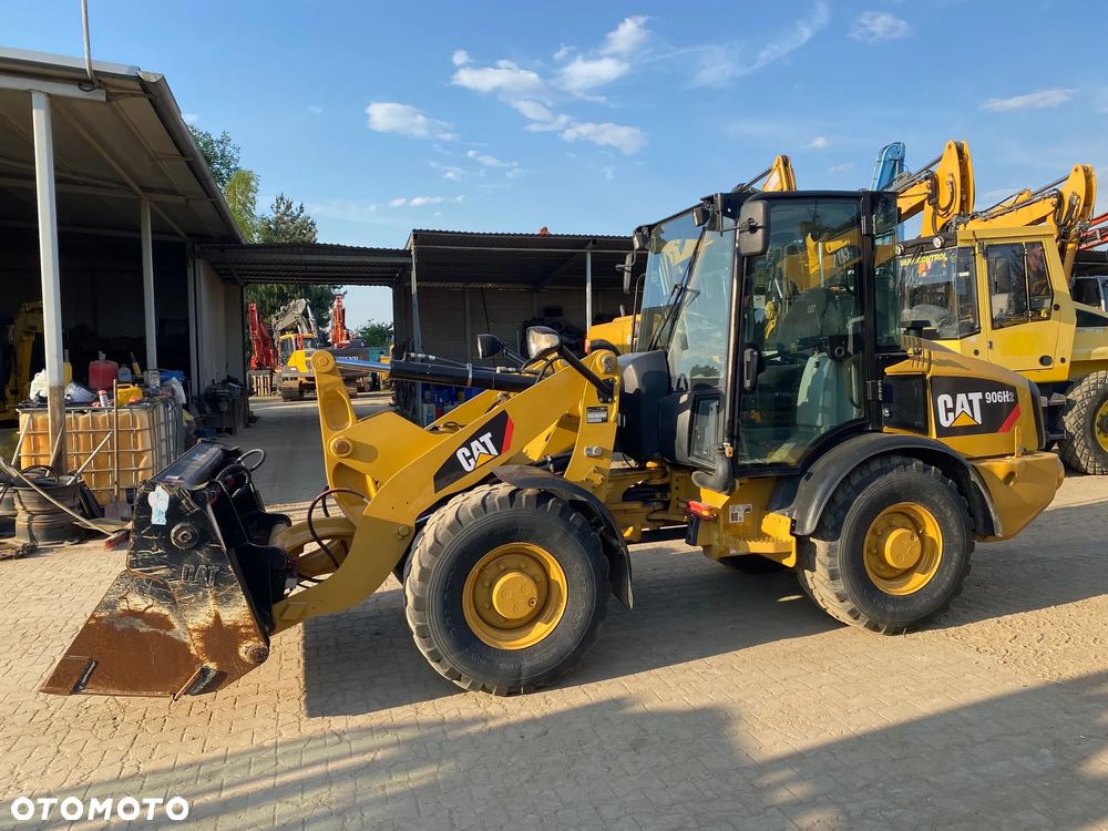 Caterpillar CAT 906H2, 2013 ROK, ŁYŻKA OTWIERANA + WIDŁY, z NIEMIEC, SUPER STAN, - 9