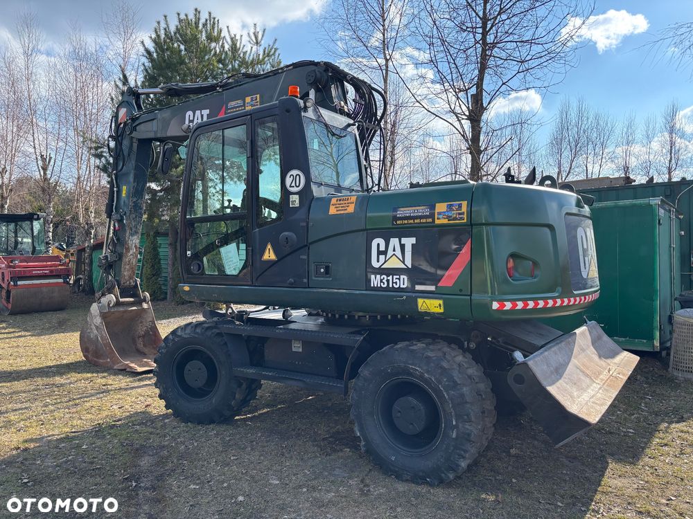 Caterpillar M315D rok 2013r 14mtg ZEPPELIN GERMANY - 2