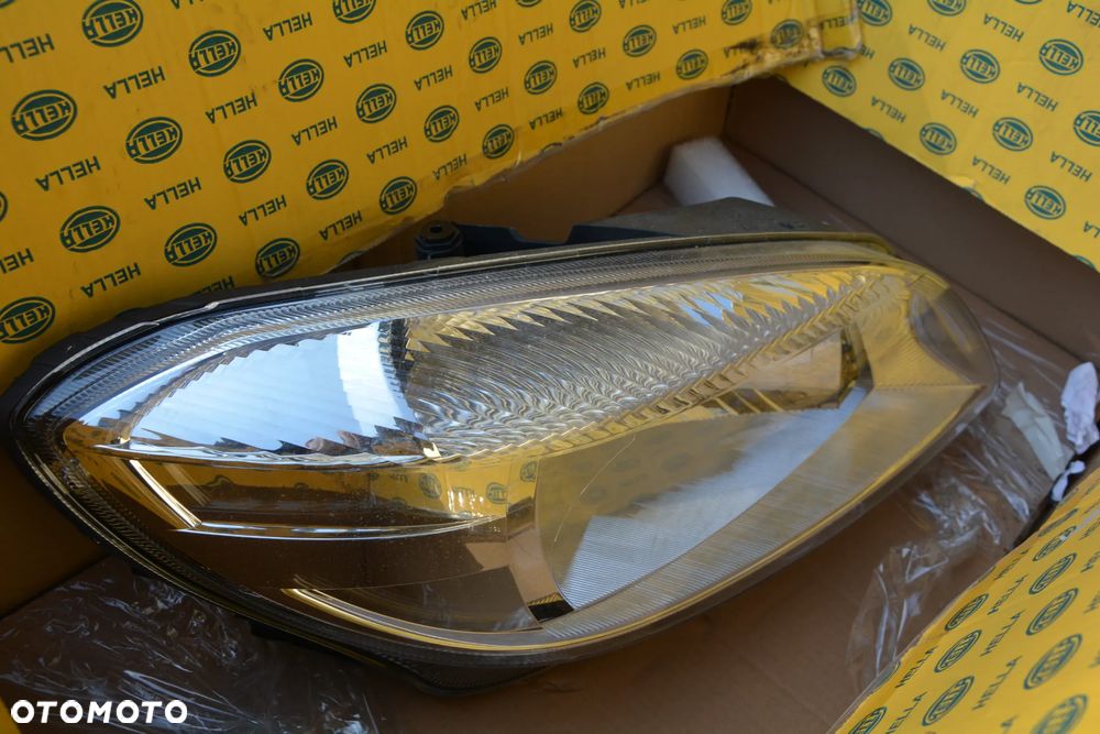 Skoda Fabia / Roomster Reflektor HELLA 1EL 010 417-371 (Z lewej) - 1