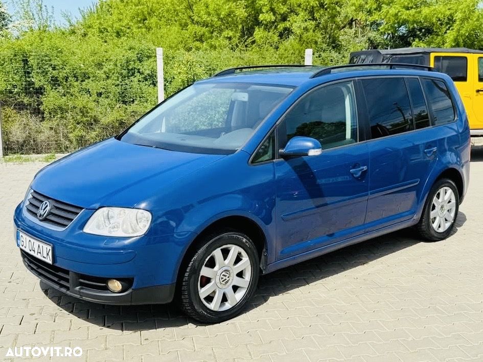 Volkswagen Touran 2.0 TDI DSG United - 1