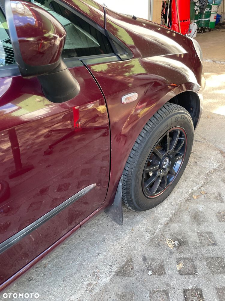 Fiat Punto 1.2 Young - 13