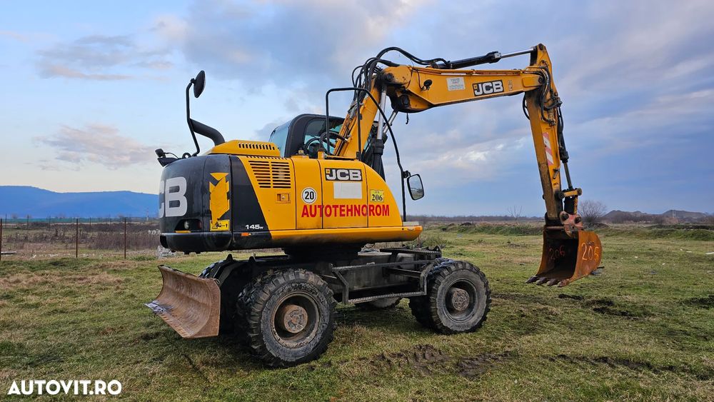 JCB JS 145 W Excavator pe roti - 4