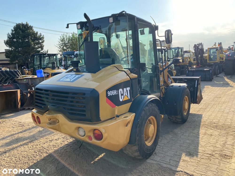 Caterpillar CAT 906H2, 2013 ROK, ŁYŻKA OTWIERANA + WIDŁY, z NIEMIEC, SUPER STAN, - 5