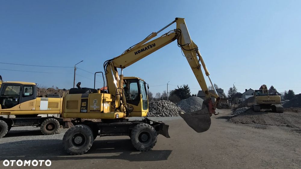 Komatsu PW140 - 26