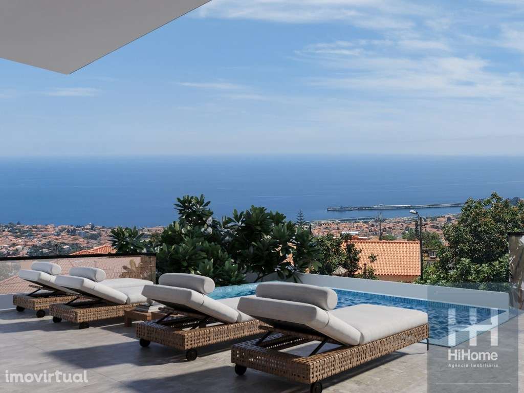 Moradia T3 com vista panorâmica sobre o Funchal no Livramento - Grande imagem: 2/25