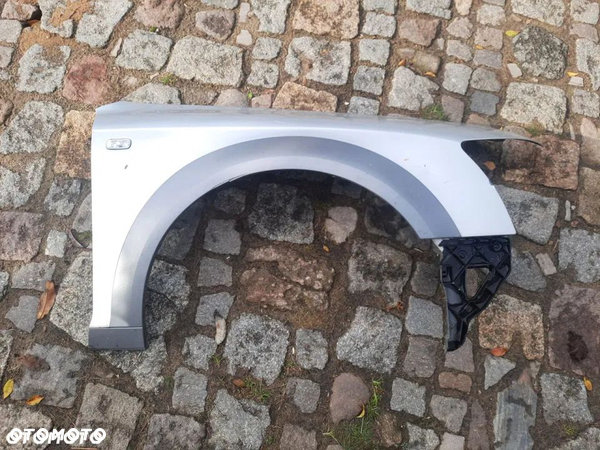 Błotnik prawy przedni przód audi A6 C6 allroad nakładka