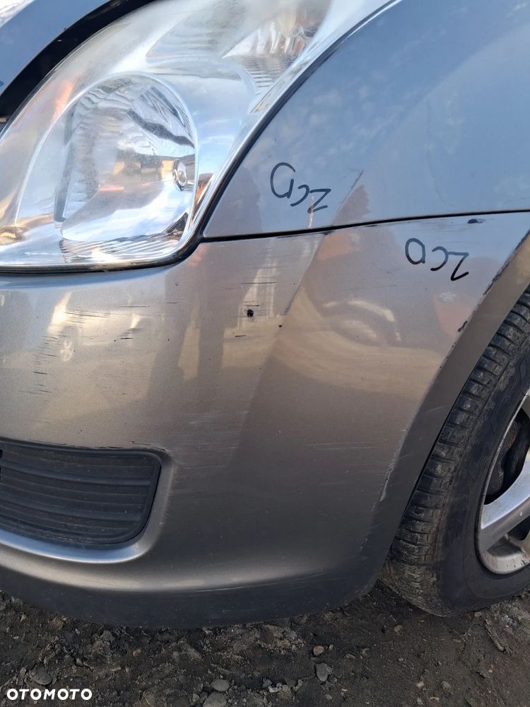 Suzuki Swift 05 zderzak przod ZCD - 7