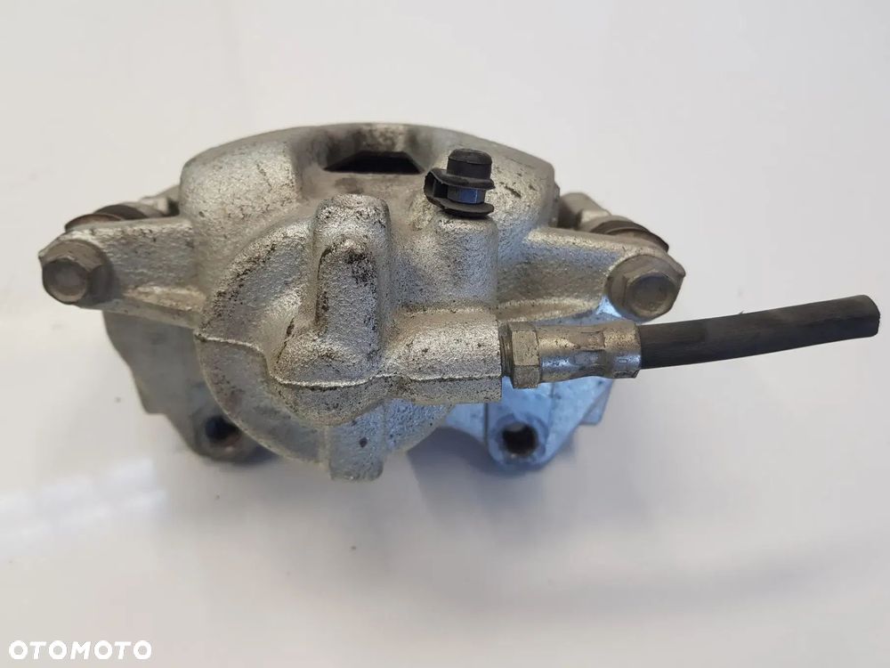 Zacisk hamulcowy jarzmo prawy przód OPEL CORSA D ADAM FIAT GRANDE PUNTO EVO PANDA 500 DOBLO FIORINO LINEA ALFA ROMEO MIT - 4