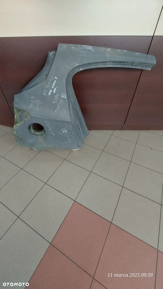 Opel corsa E 5D  poszycie błotnika tył prawe orginał - 1