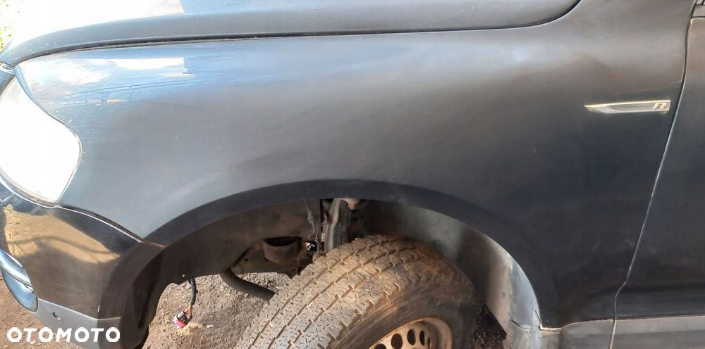 BŁOTNIK PRZEDNI LEWY VOLKSWAGEN TOUAREG I