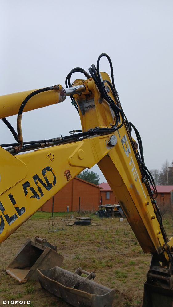 New Holland LB 115 - 30