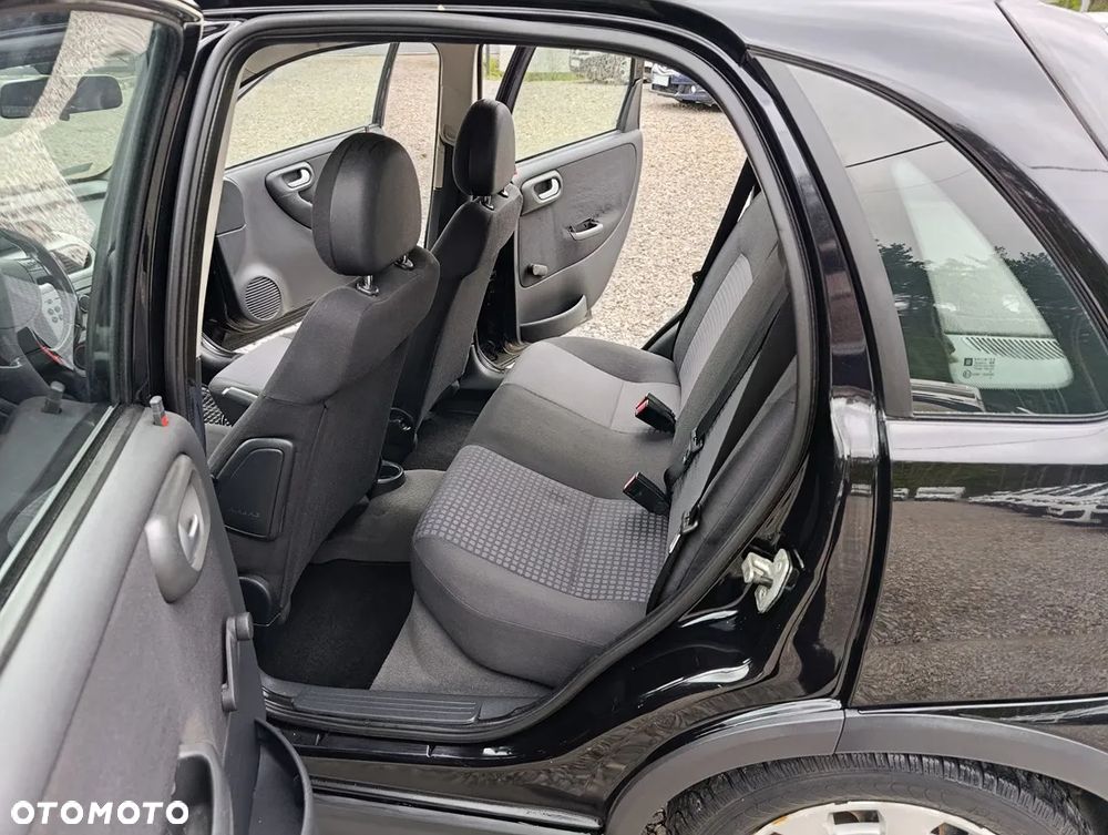 Opel Corsa 1.2 16V Cosmo - 9