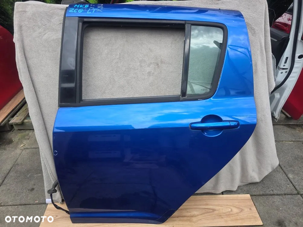 DRZWI LEWE TYŁ SUZUKI SWIFT MK6 05-10 ZCG