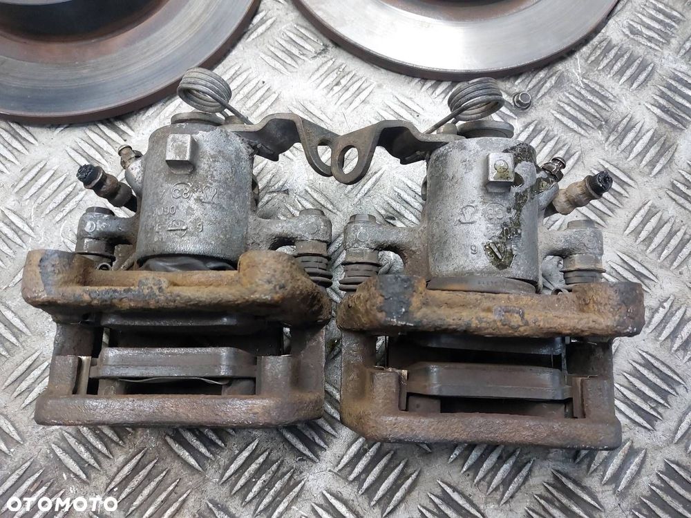 TARCZE HAMULCOWE TYŁ + KLOCKI + ZACISKI OPEL ZAFIRA B ASTRA H - 4