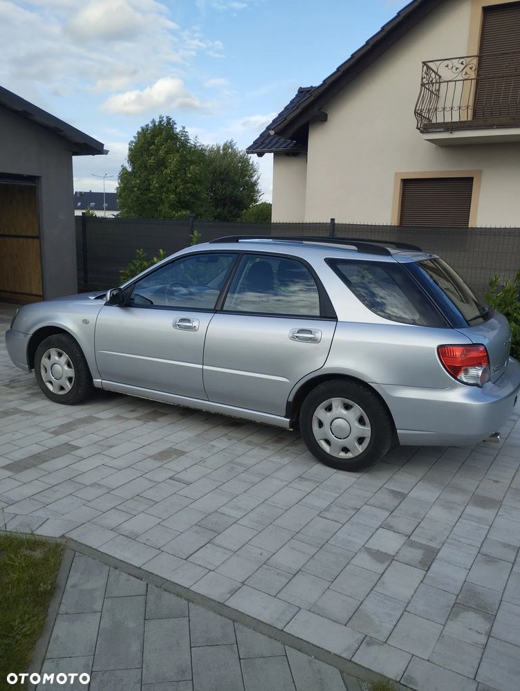 Subaru Impreza 1.6 TS - 6