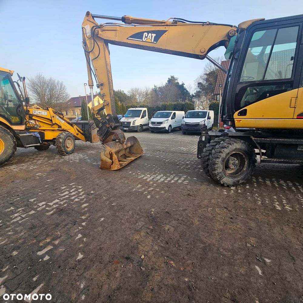 Caterpillar M316C - 3
