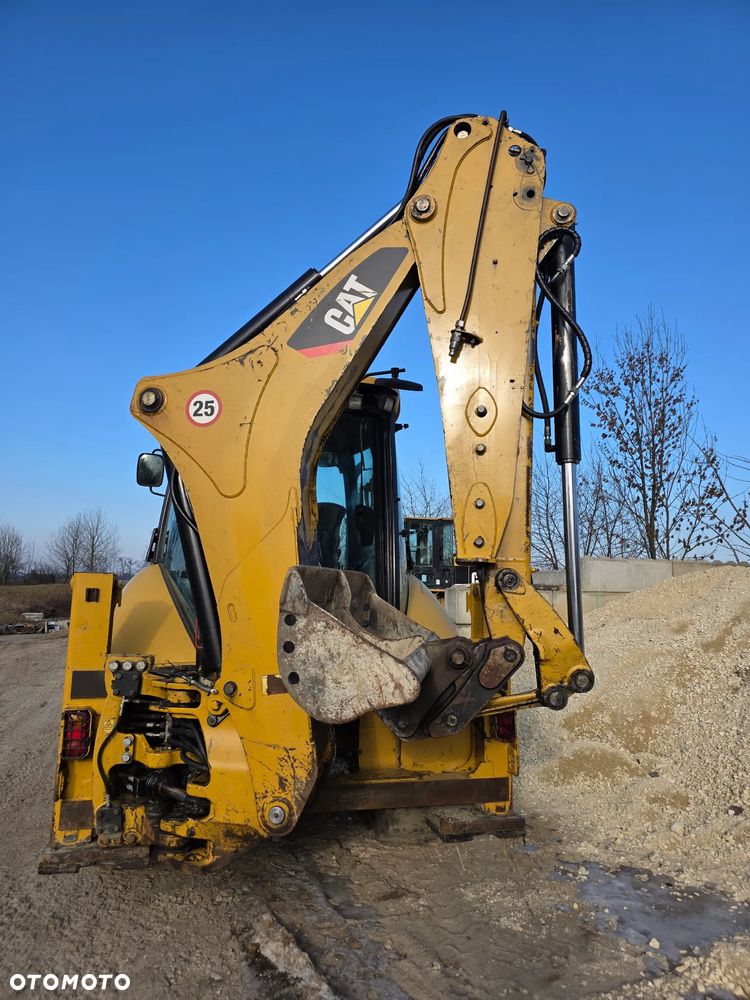 Caterpillar 428 - 9