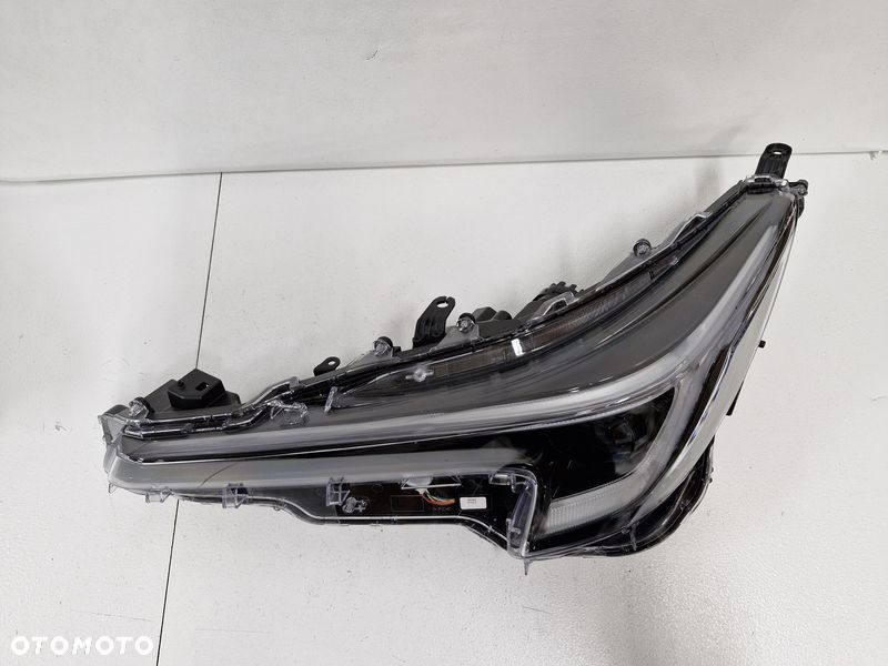 TOYOTA COROLLA E21 LIFT LAMPA REFLEKTOR LEWY PRZÓD EU LED 81150-02X10 - 2
