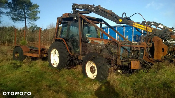 New Holland TM 115 TM115 + HDS/dźwig + chwytak + przyczepa ciągnik lesny / rolniczy