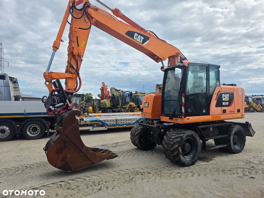 Caterpillar Cat M314F Rototil z Niemiec - 2