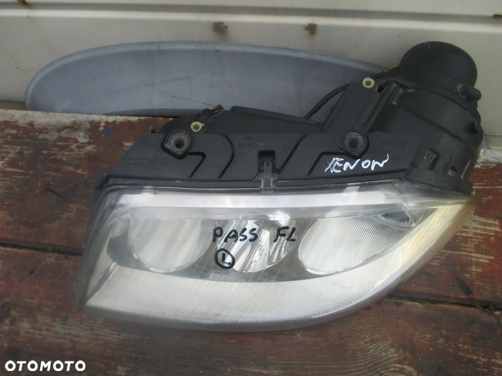 lampa lewa Passat B5 LIFT Xenon Hella Europa - 3