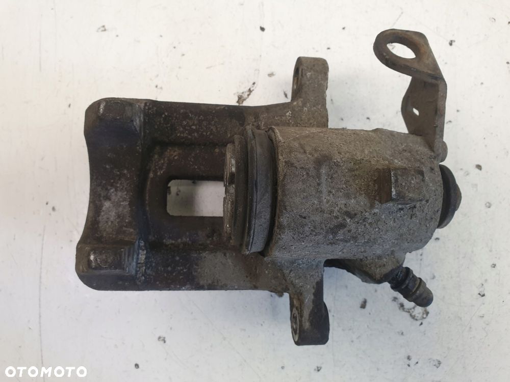 Skoda Octavia I ZACISK HAMULCOWY lewy TYŁ TYLNY - 2